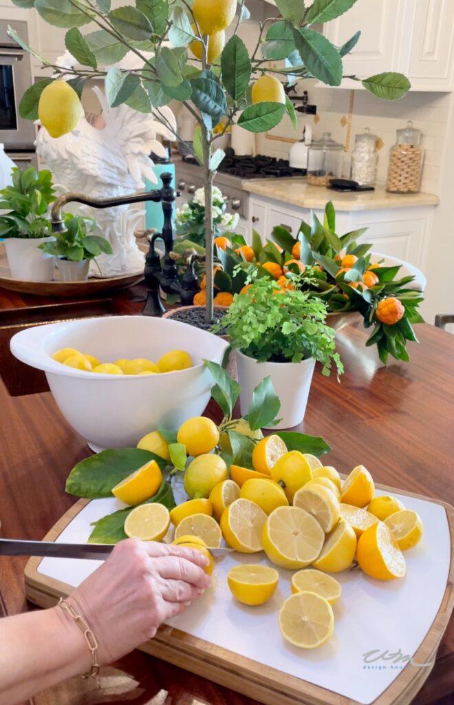 cutting up lemons in a kitchen 