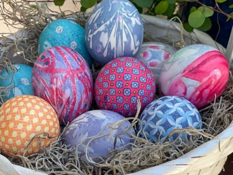 We tie-dyed Easter eggs in a basket.