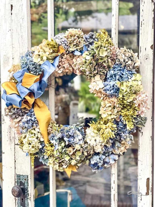 21 ways to decorate with hydrangeas- dried hydrangea wreath on she shed door