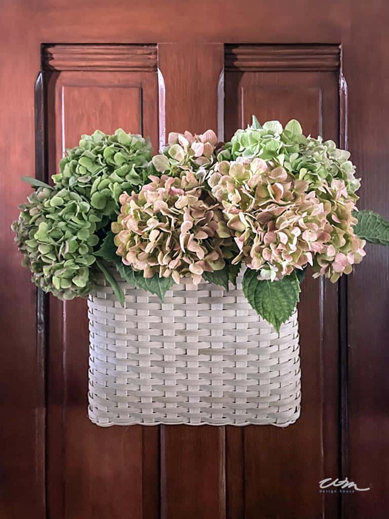 basket of flowers on door