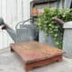 Distressed Wooden Pedestal with 2 Side Rail Legs