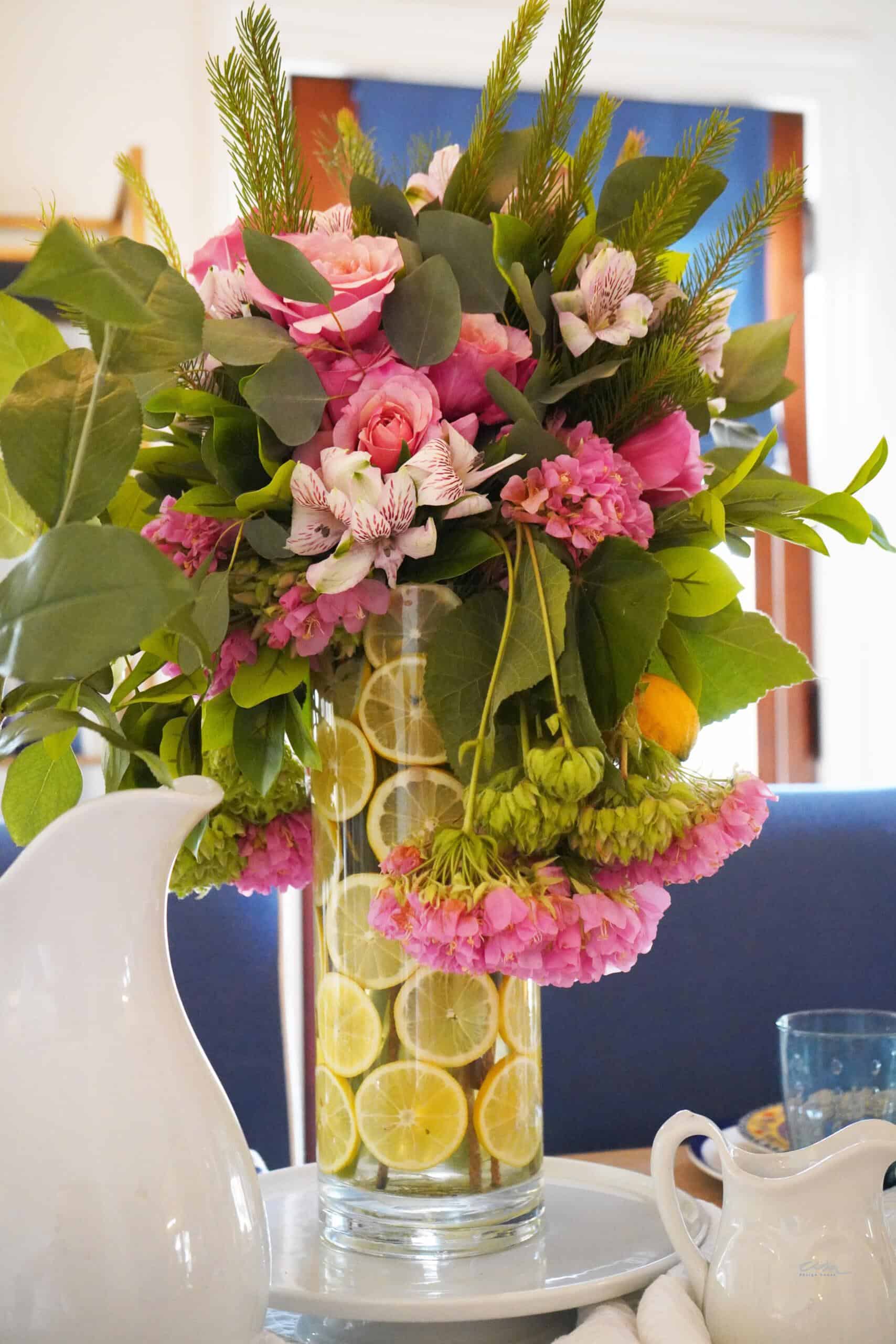 DIY tall cylinder flower vase with sliced lemons and pink flowers