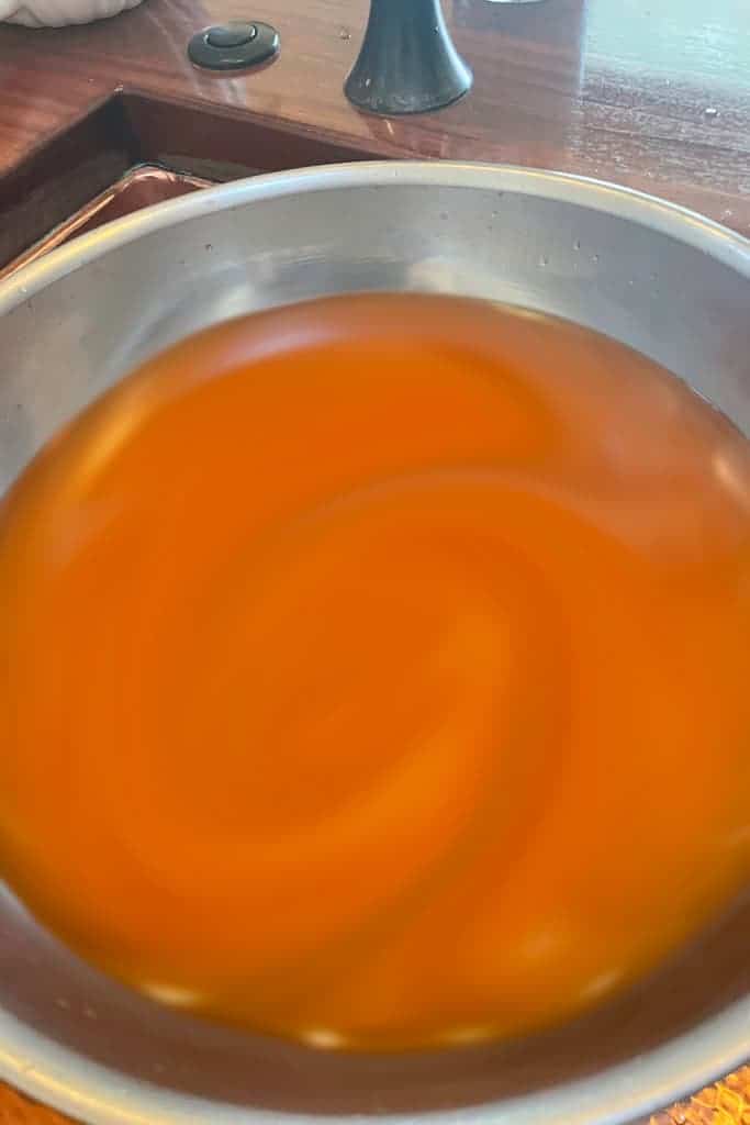 Carrot dye in a bowl, ready for fabric. 