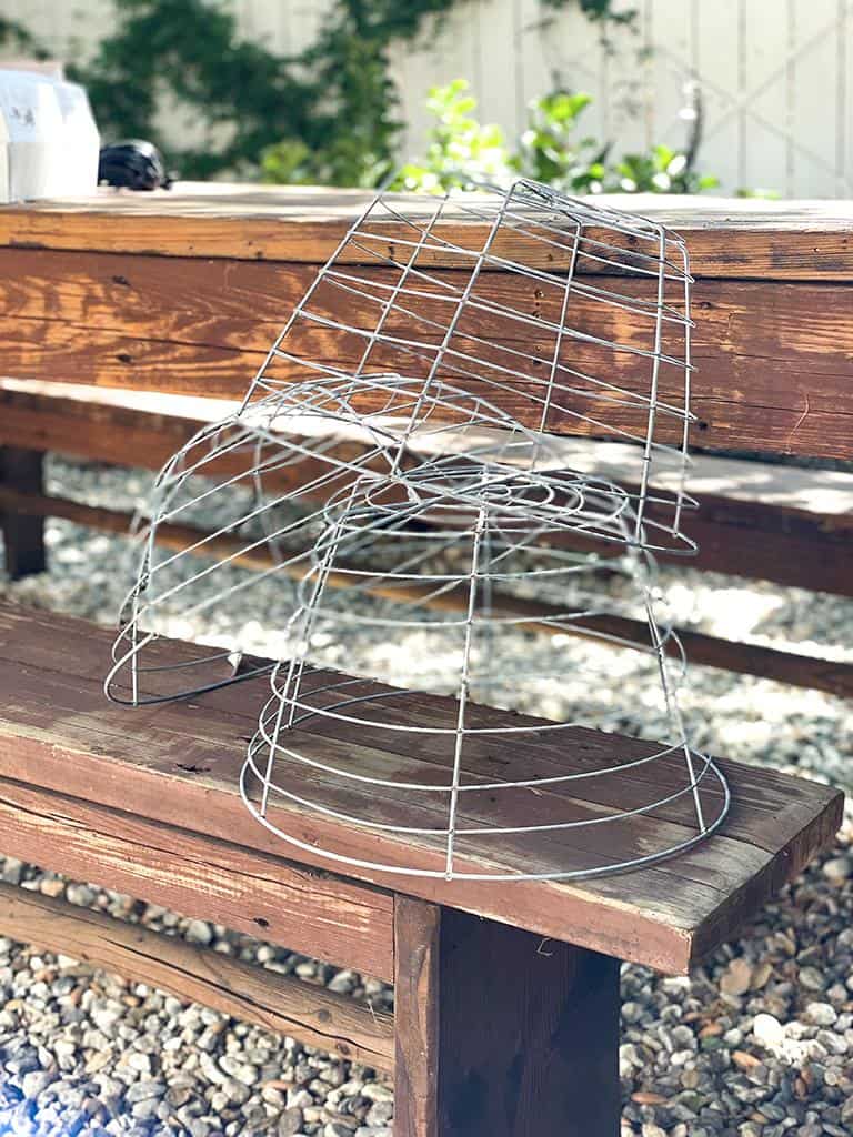 transform old wire garden baskets into an outdoor pendant light