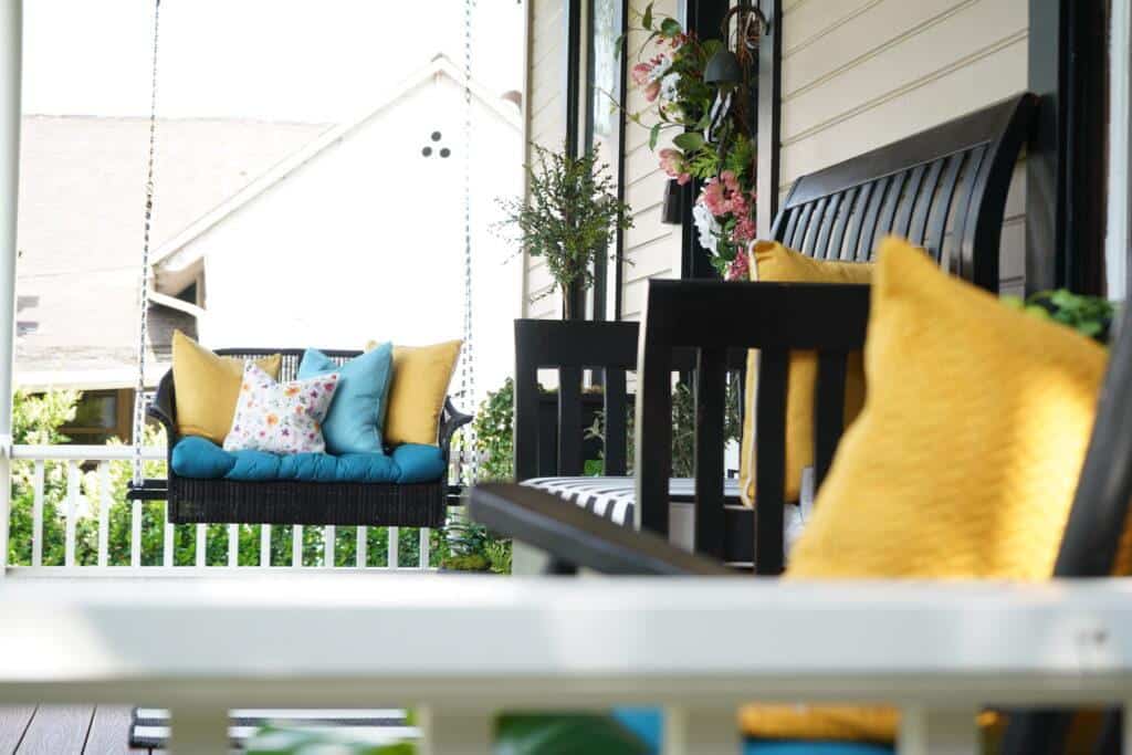 bright, colorful pillows for a spring or summer porch decor