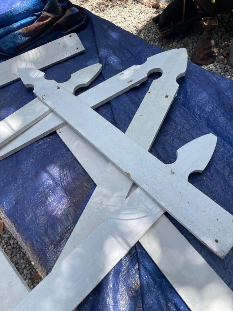disassembled picket fence pieces - starting to create the shape of my DIY garden art easel