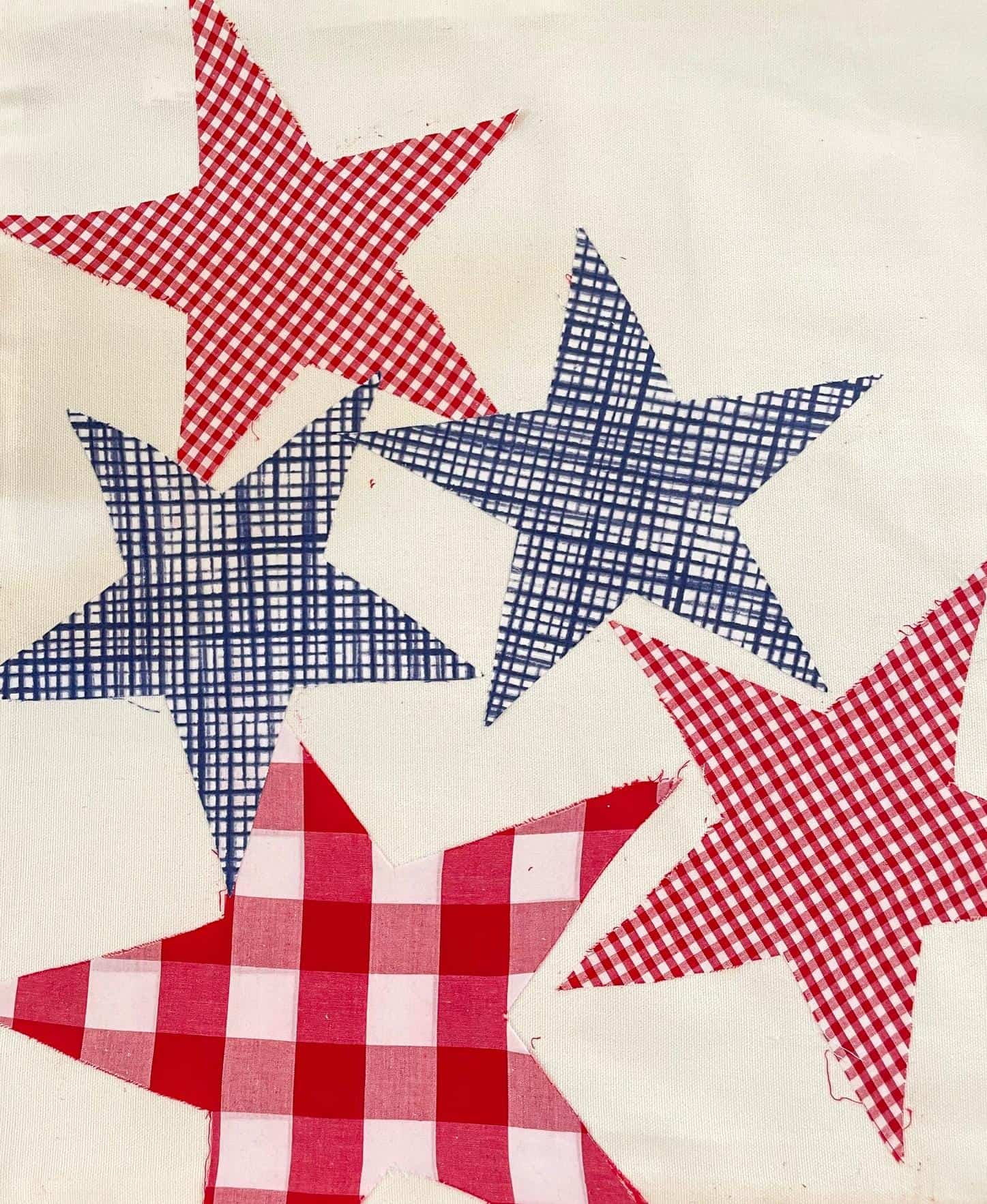 fabric star cutouts for DIY throw pillow for the fourth of July