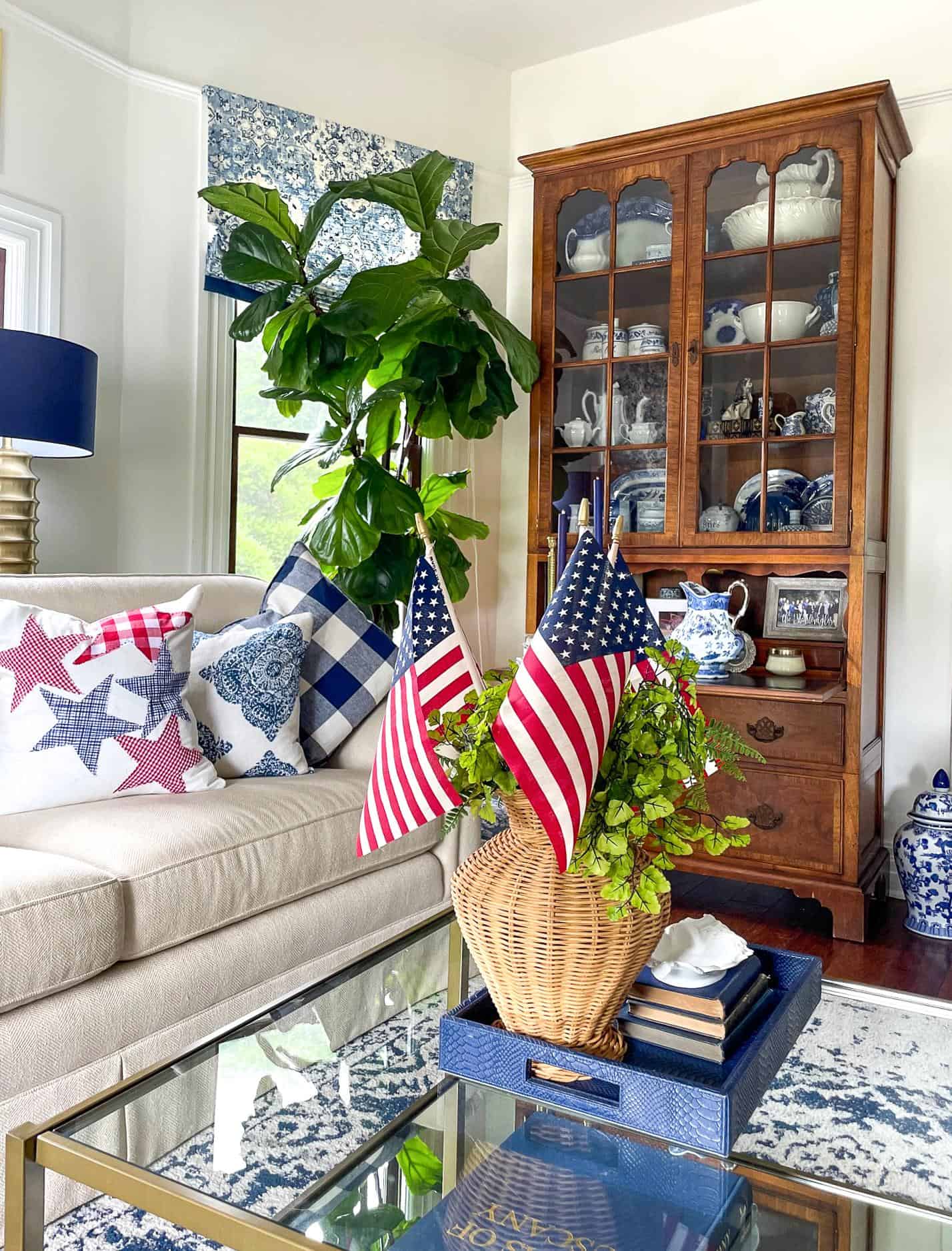 DIY star throw pillow for fourth of July pillow styled on the living room couch