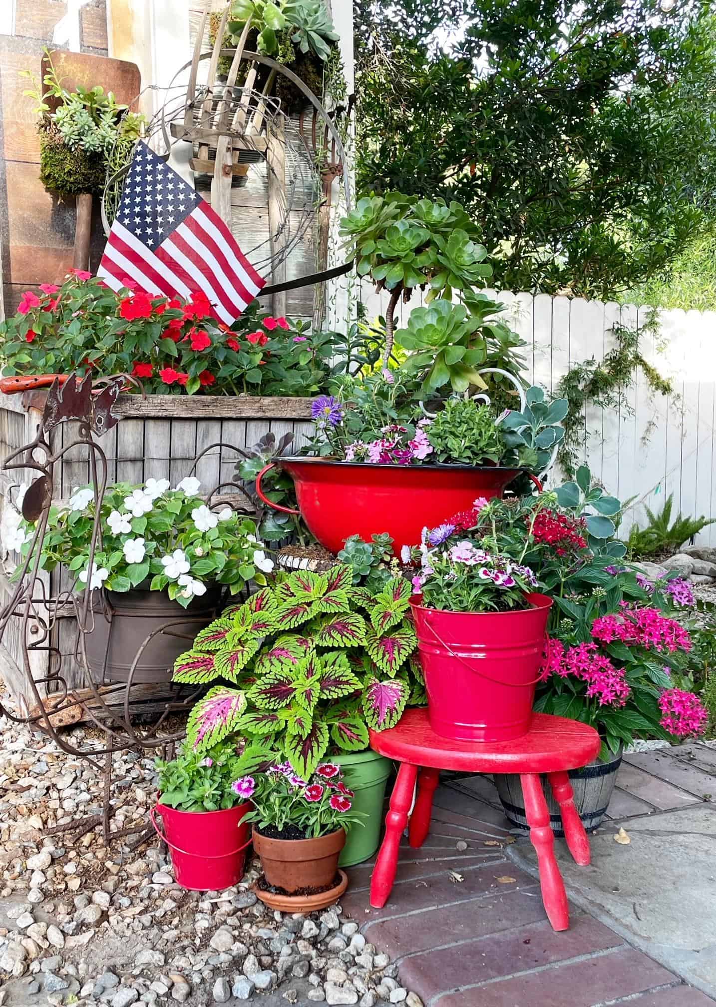Decorating with American Flags in the garden by putting flags in flower pots