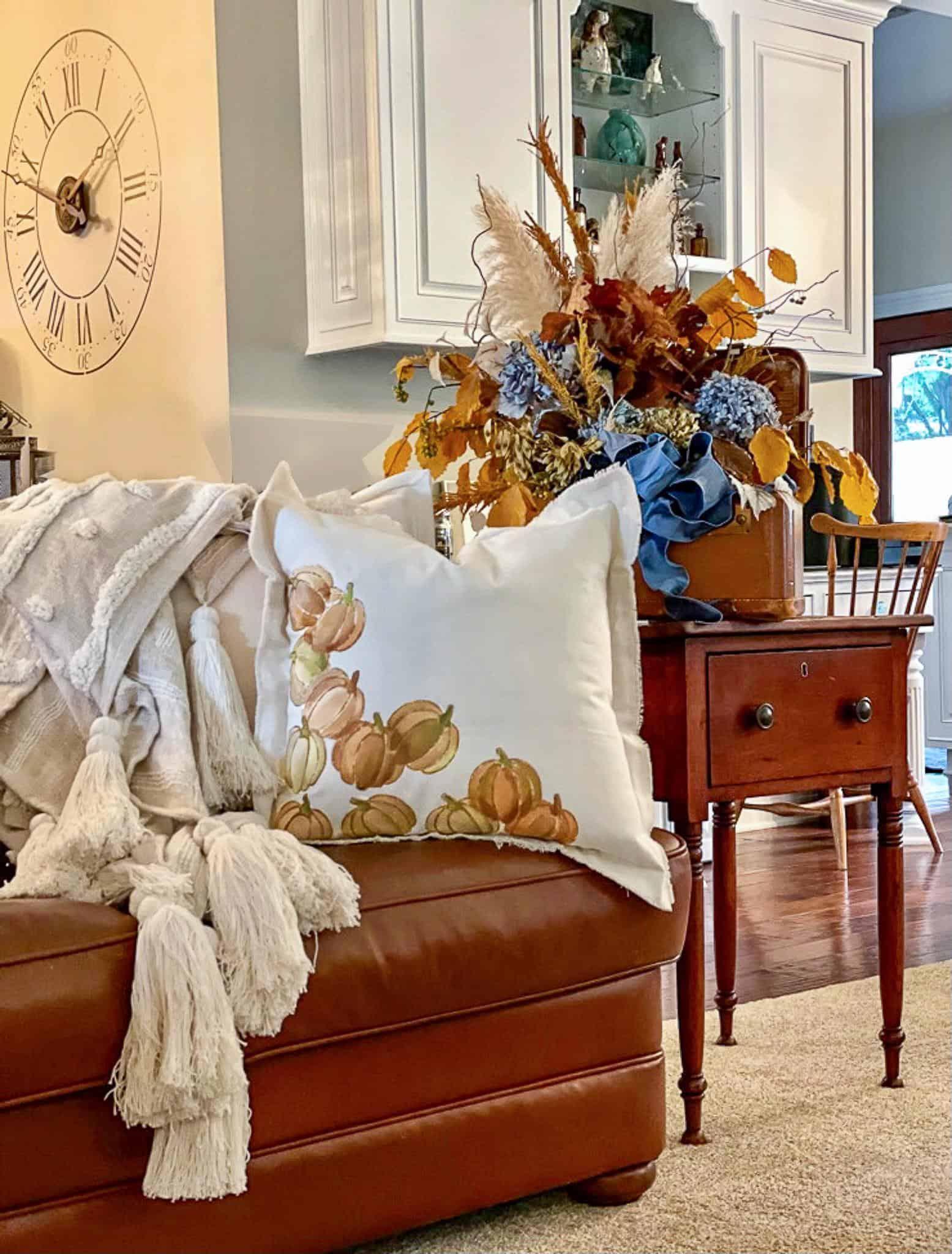 DIY Fall throw pillow with painted pumpkins