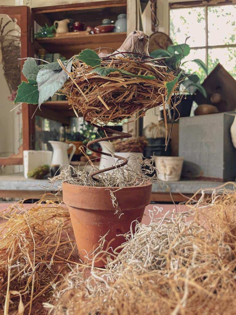 DIY handmade birds nest in a vintage bed spring 