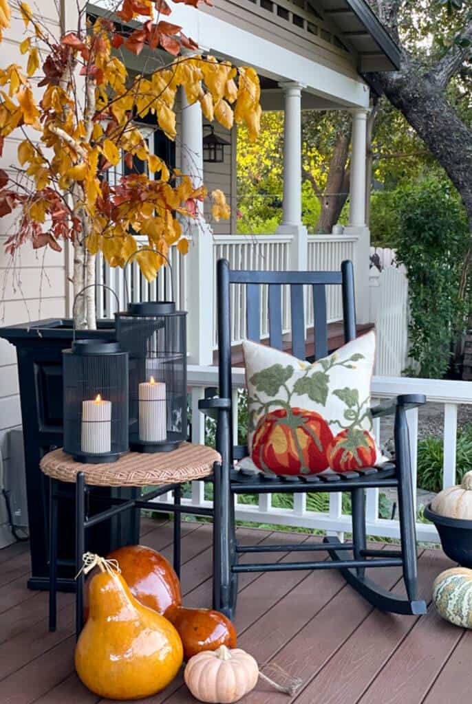 Fall Front porch with fall throw pillows 