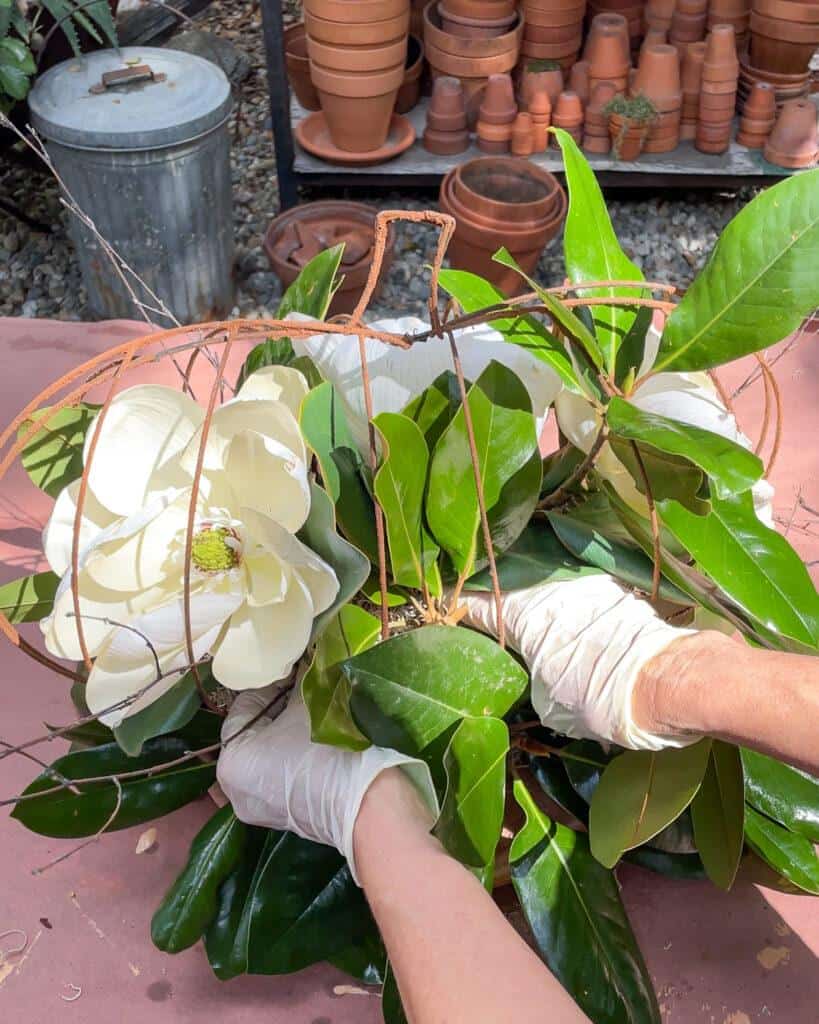 Step 6: Add magnolia leaves