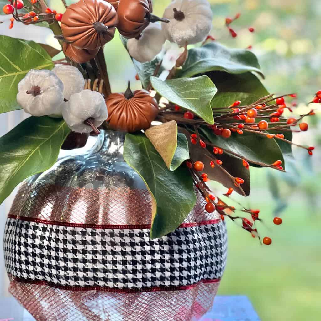 Mercury glass pumpkin with ribbon and florals 