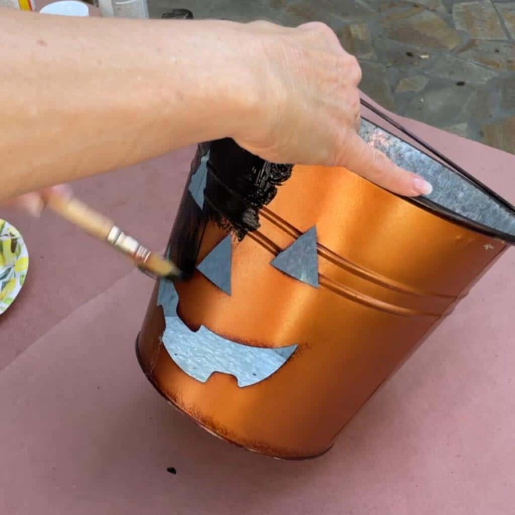 Painting an outdoor pumpkin to look rusty 
