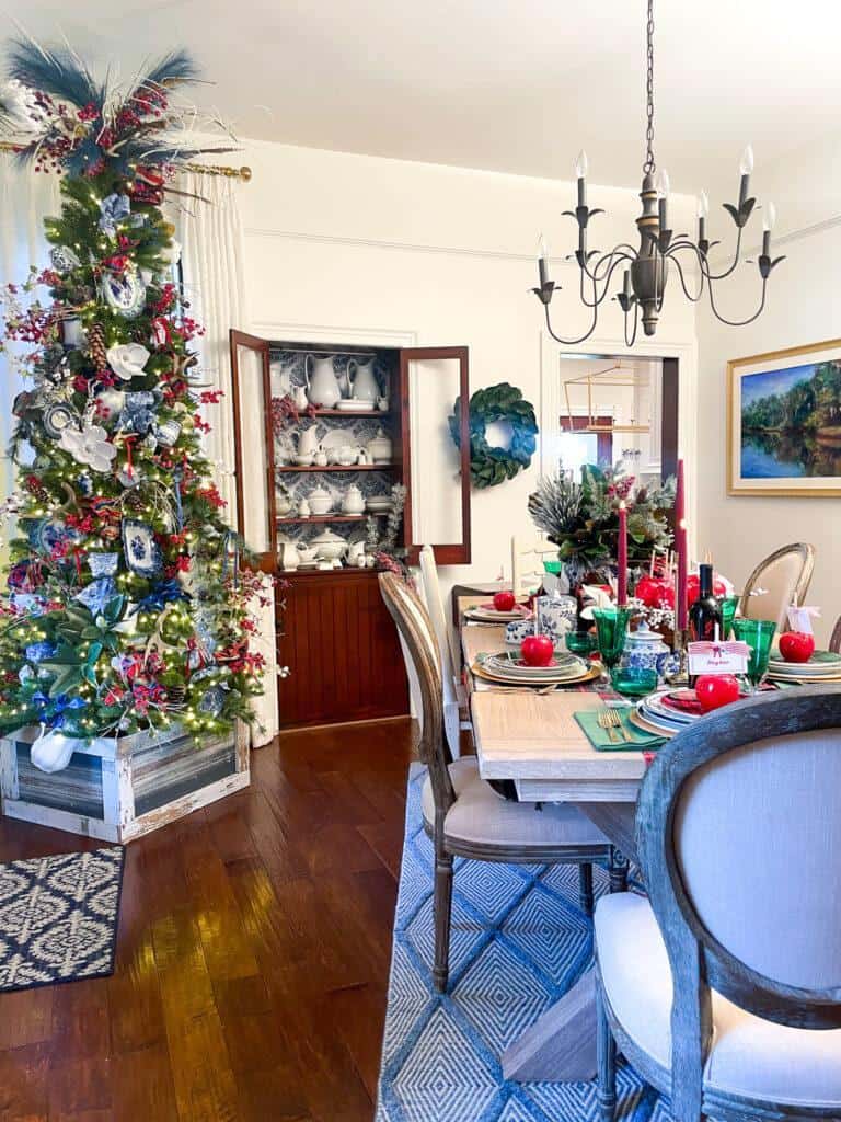 Unique Christmas tree in the dining room adorned in blue and white 