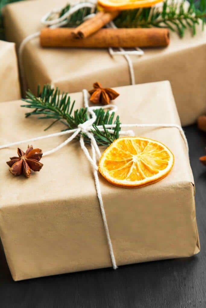 Christmas package wrapped with dried orange slices 