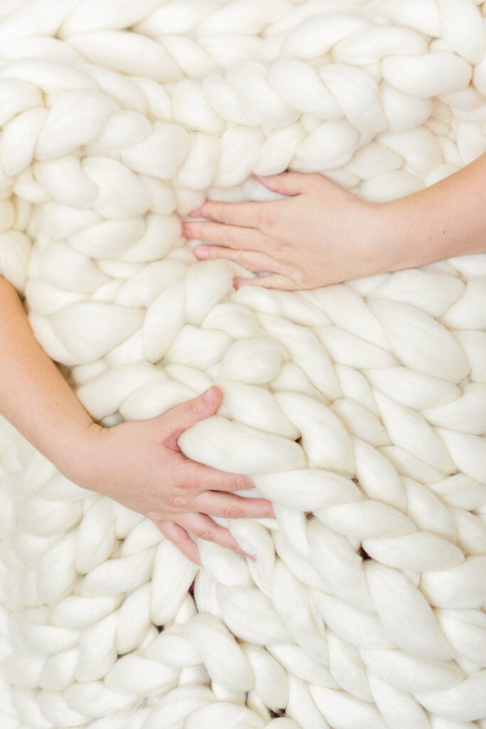 Best chunky yarn for a crochet blanket- wool yarn in off-white. 
   