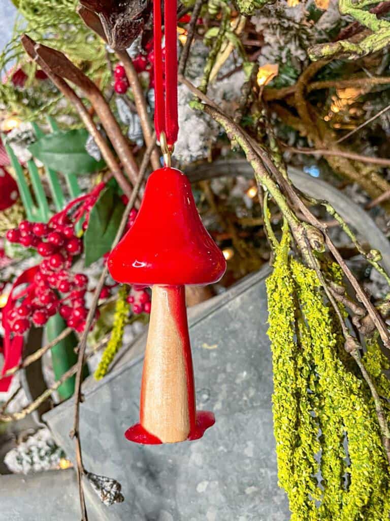 mushroom ornament in garden tree 