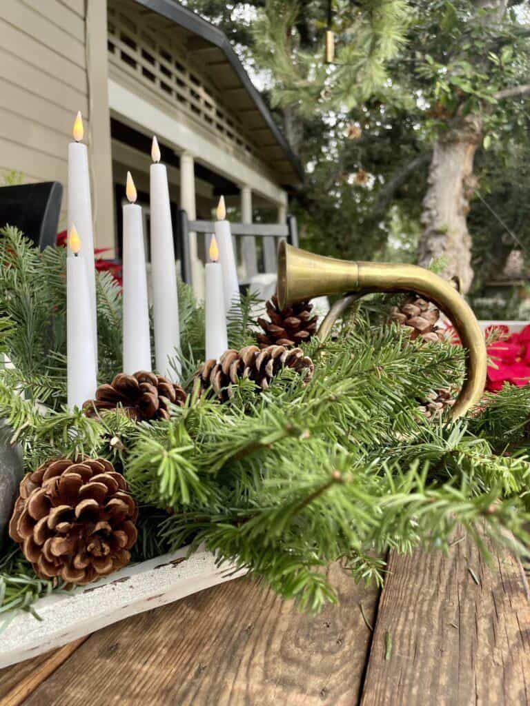 Dough bowl full of greens and cnadles-Outdoor Christmas porch decorations