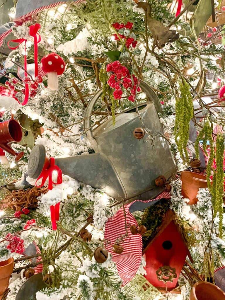 Galvanized watering can in the christmas tree 
