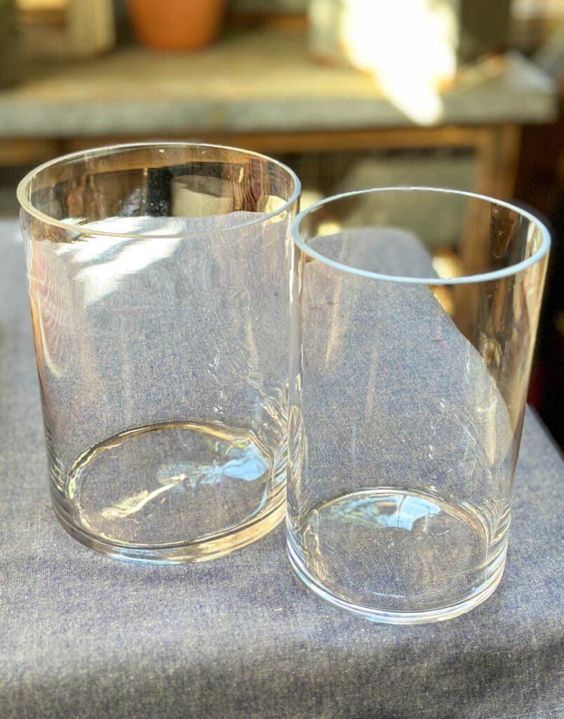 two round glass vases 