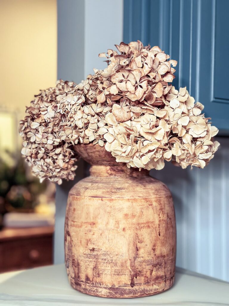 dried hydrageas in wood vase
