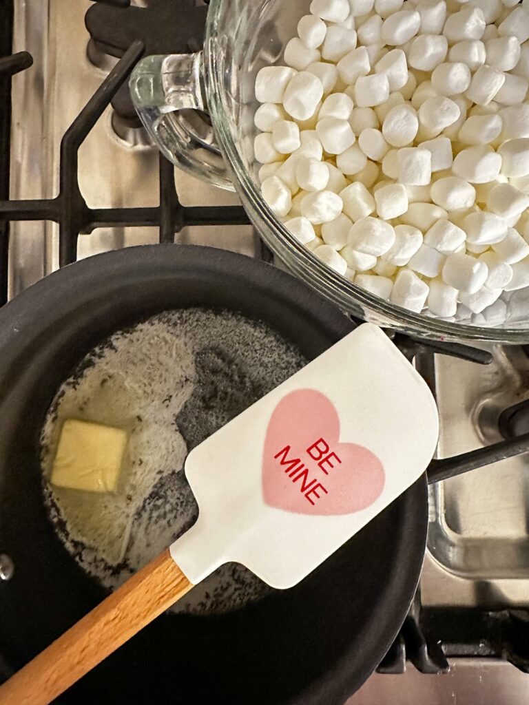 butter in pan with marshmallows ready to go in 