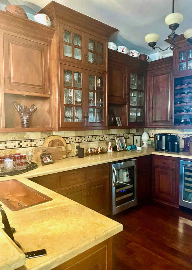 Dark brown cabinets in an old butlers pantry