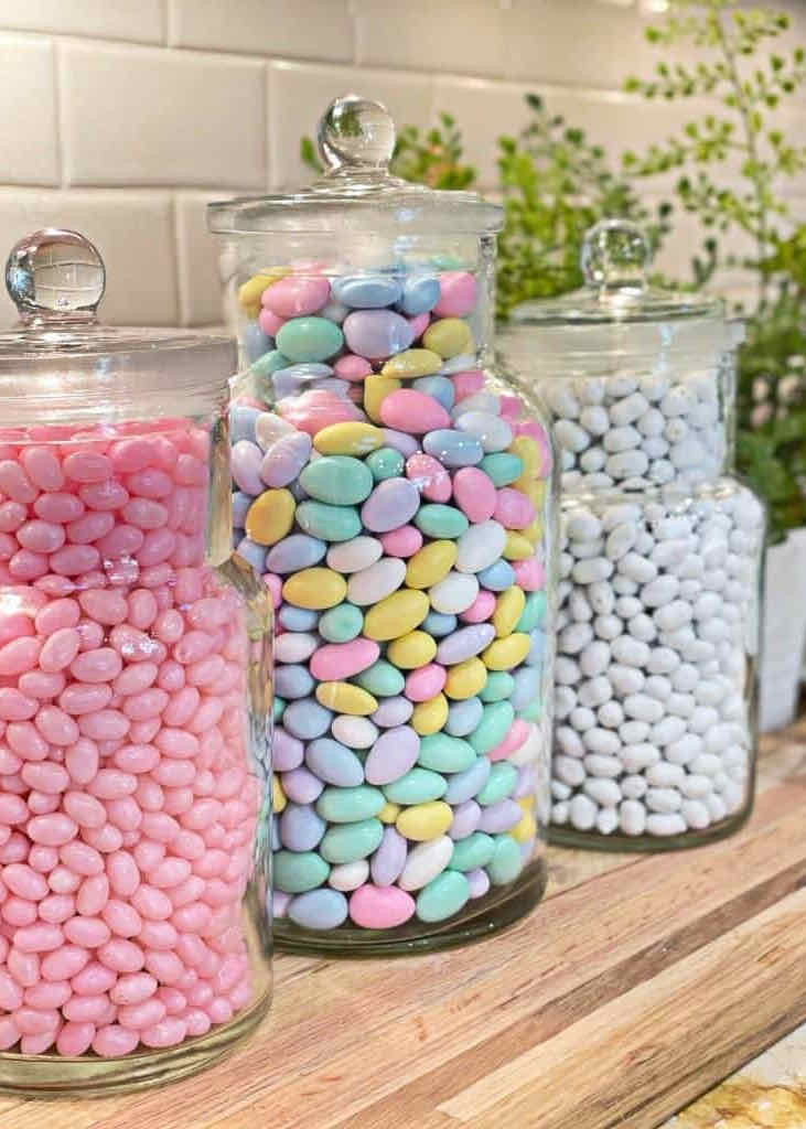 spring mantel ideas-Glass jars filled with Easter Candy-