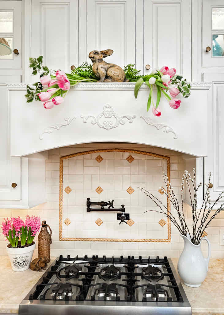 Spring Mantle Ideas in the kitchen- pink tulips over stove 