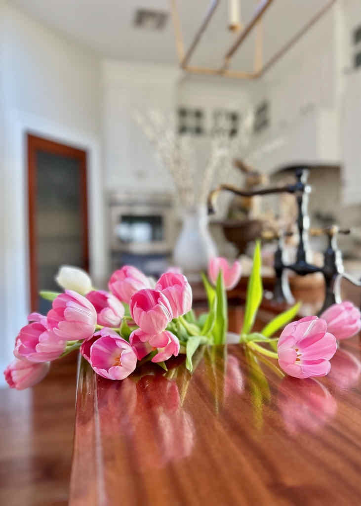 spring mantel ideas-pink tulips in the sink 