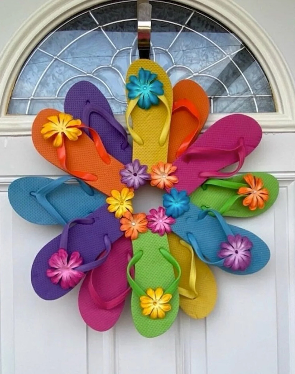 flip flop wreath in rainbow colors with flowers