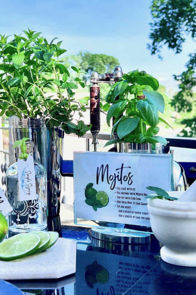 MOJITO RECIPE AND DRINK SUPPLIES ON A TABLE