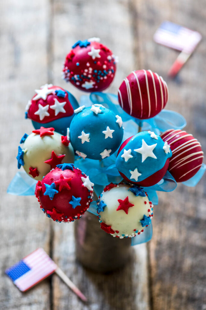 Memorial Day Party Ideas-Cake pops decorated in red, white and blue for Memorial day or 4th of July