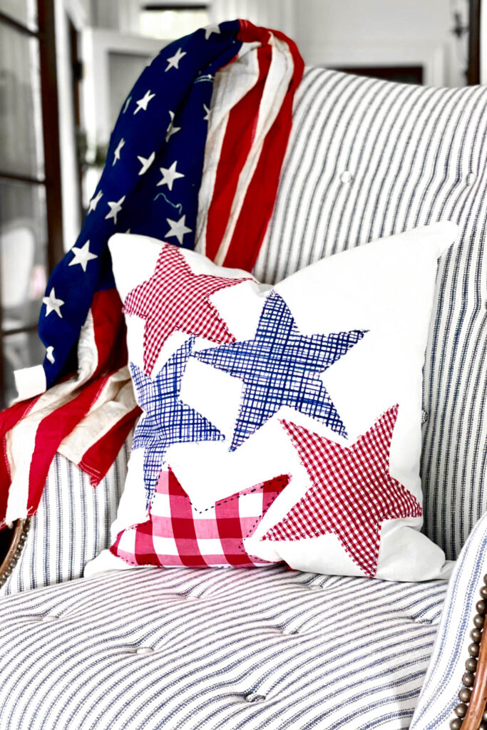 Handmade pillow with patriotic stars sitting on a chair