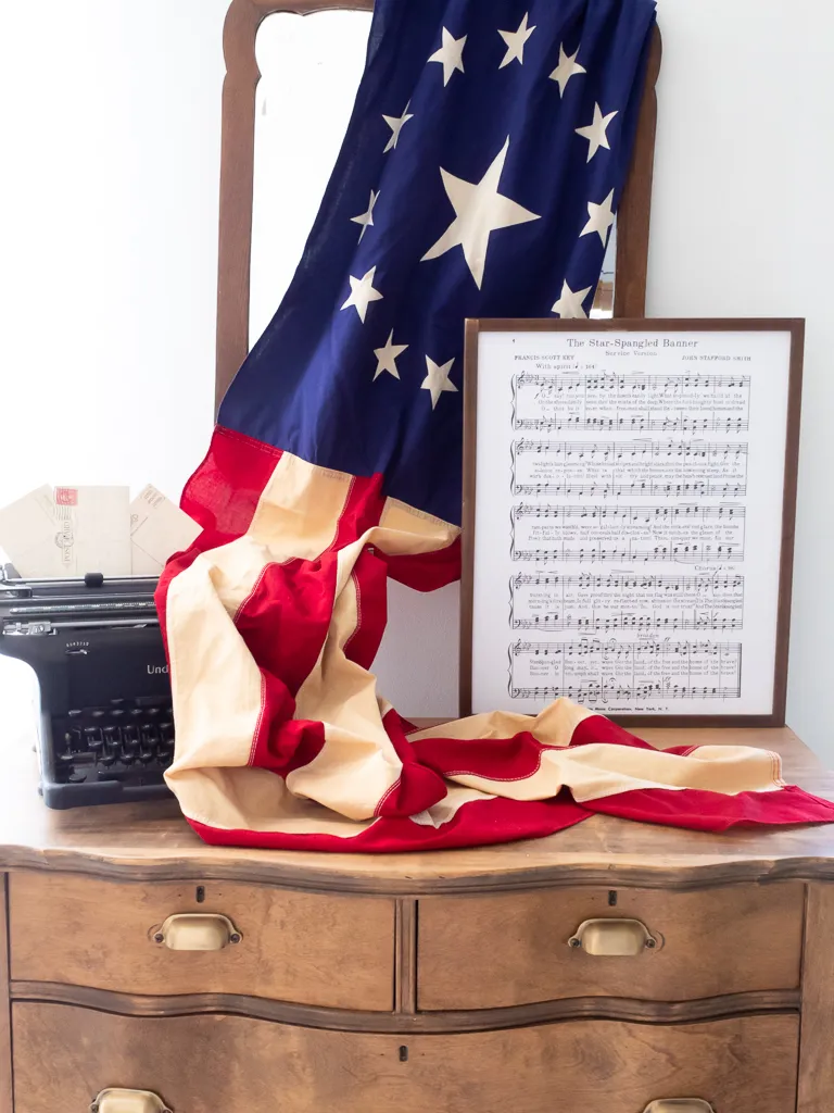 American flag with a typewriter and sheet music 