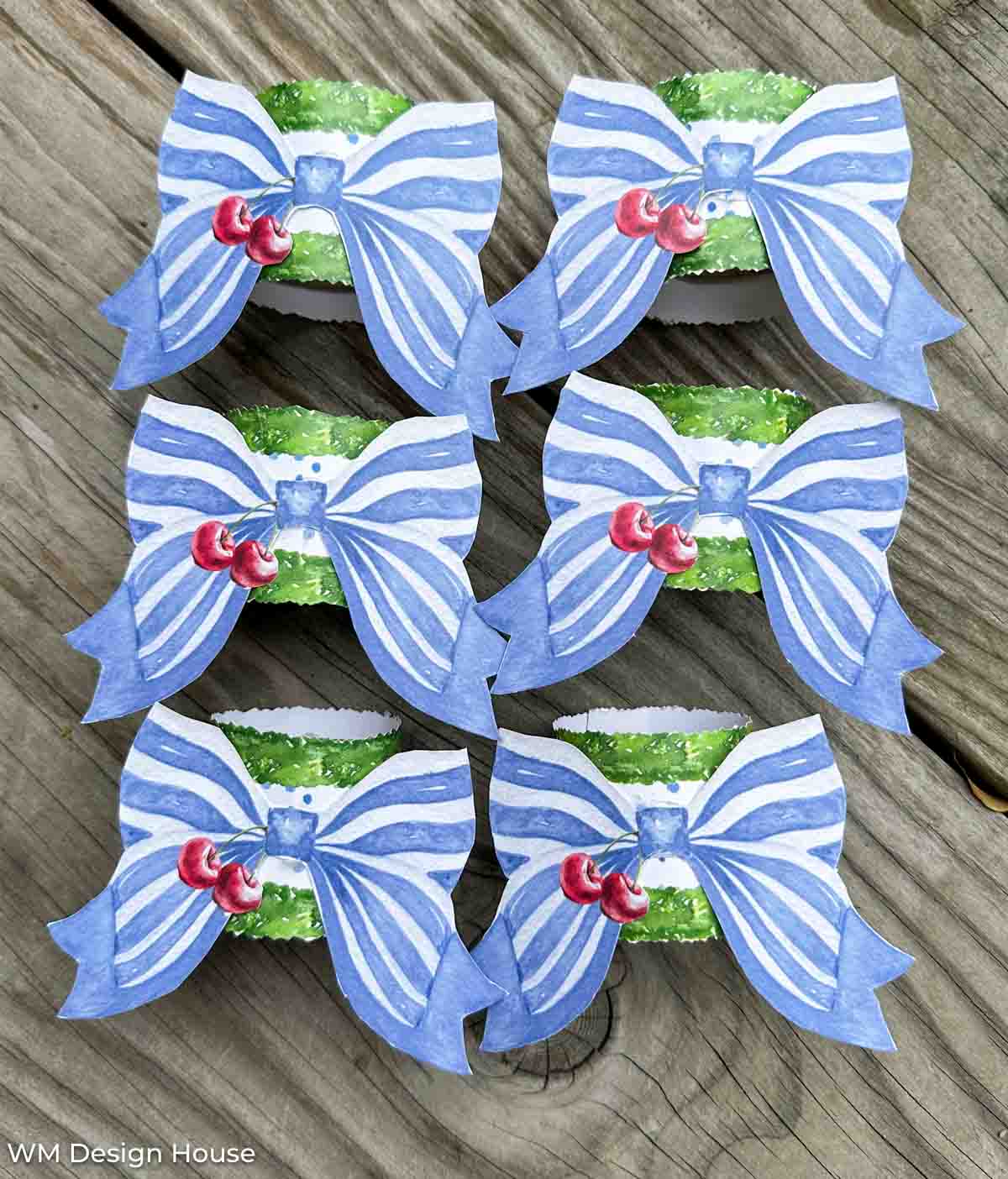 Napkin rings custom made by wendy with a blue and white stripe bow