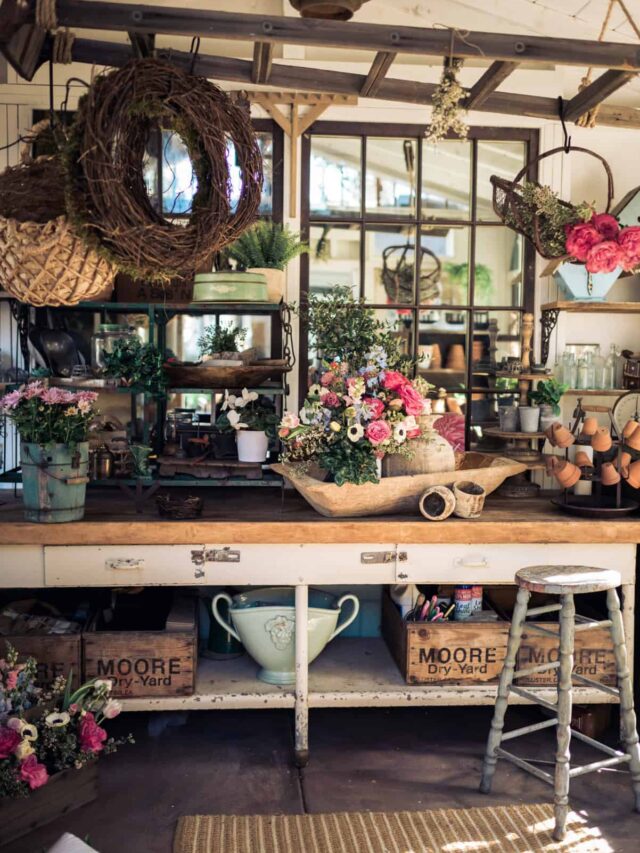 Inside of shed wit flower arrangement on the counter