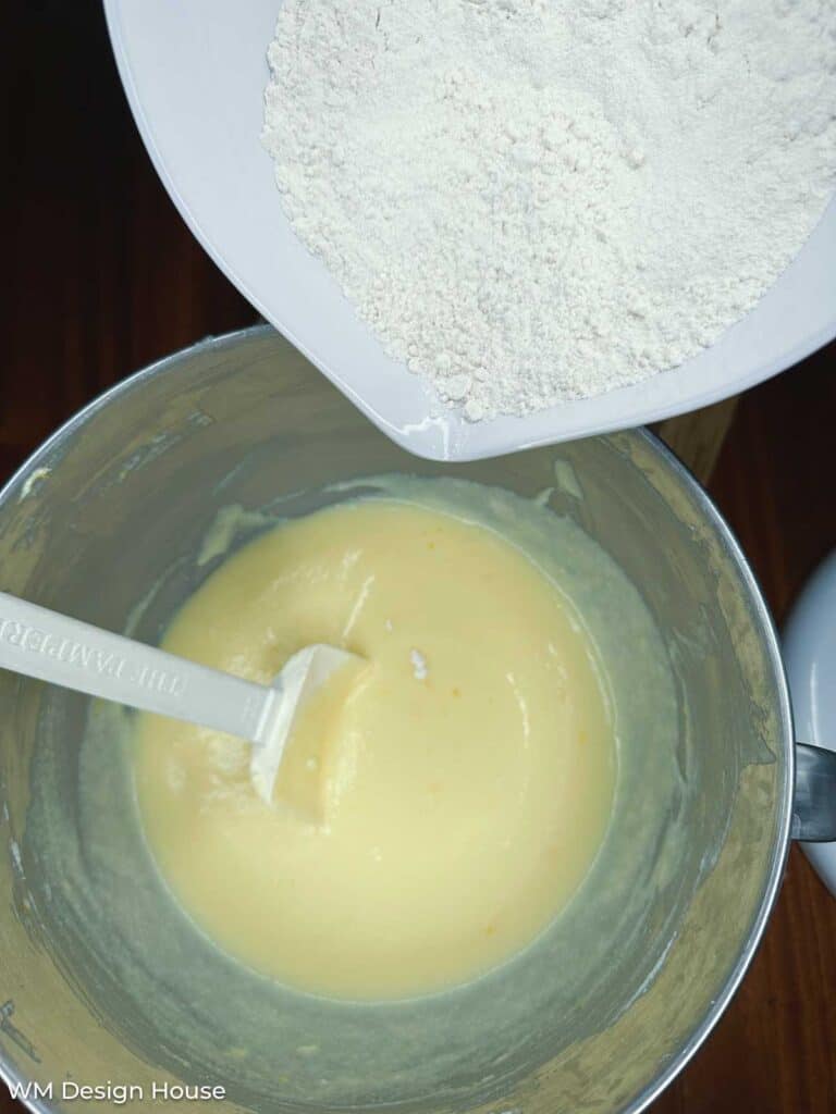Nordstrom Lemon ricotta cookies- mixing flour into the liquid mixture