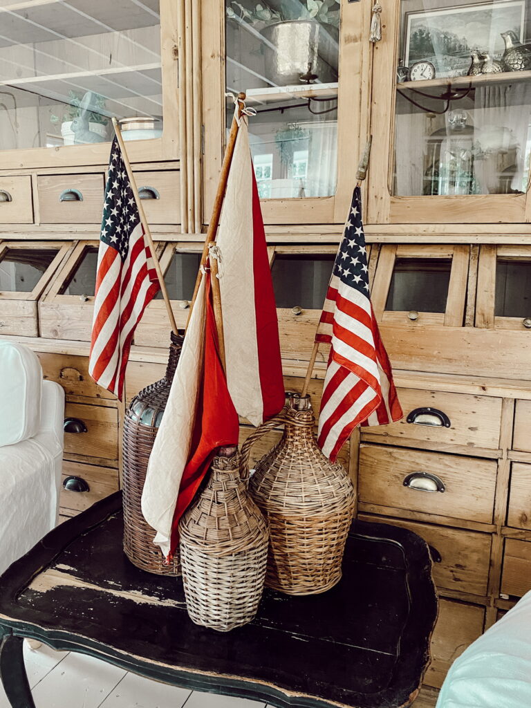 vintage fourth of july display of american flags 