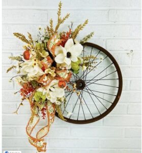 The Best DIY Wagon Wheel Wreath With Dollar Tree Ribbon