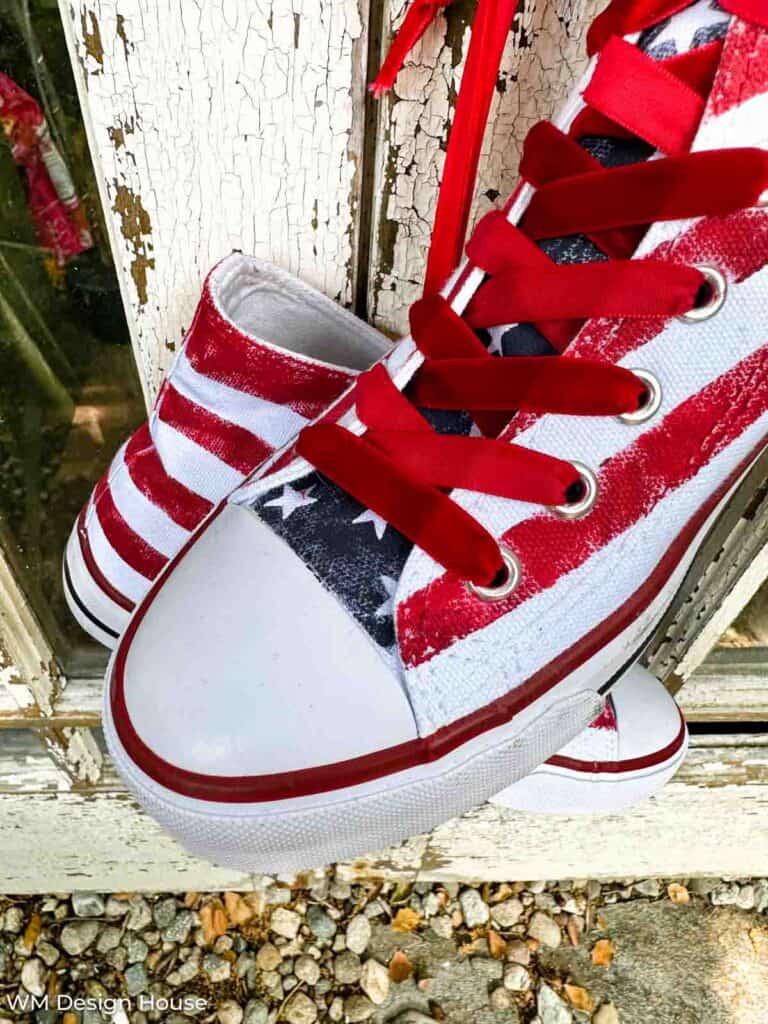 Up close of the patriotic tennis shoes and velvet laces