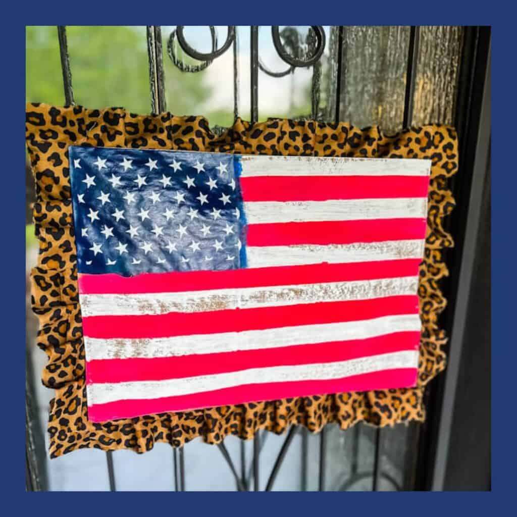 Melanie flag paitned on front door 