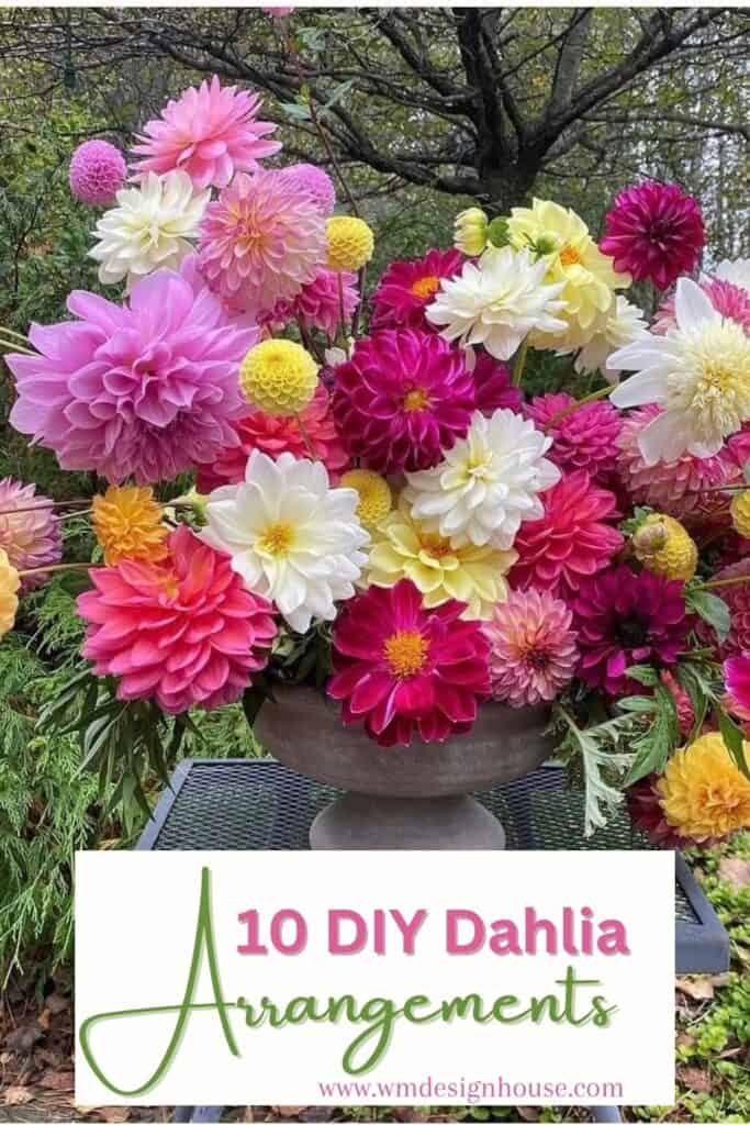 A vibrant bouquet of multi-colored dahlias, ranging from pink, purple, yellow, to white, in a rustic vase displayed outdoors. Below the gorgeous dahlia flower arrangements, text reads "10 DIY Dahlia Arrangements" with the website "www.wmdesignhouse.com".