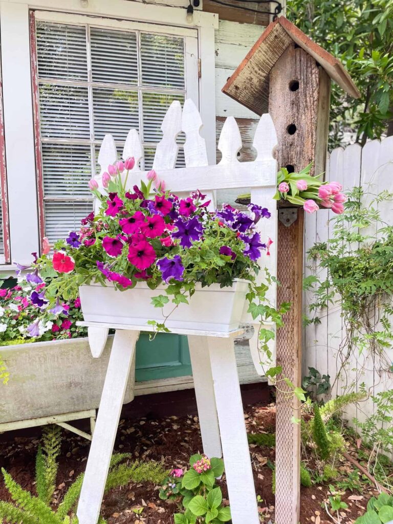 upcyled picket fence into a garden easel