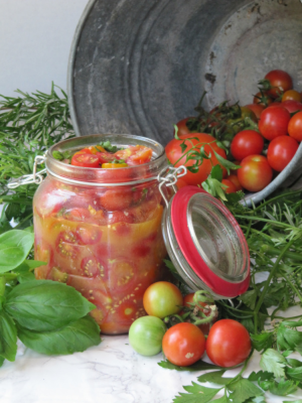 Marinated tomatoes in a jar 