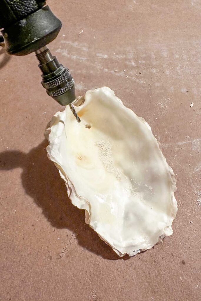 How to Make a Beautiful Wood Beaded Garland with Oyster Shell- drill hole in the Oyster with a Dremmel Drill. 