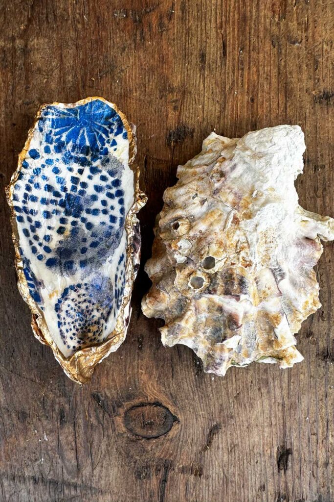 Oyster Shells decoupaged with blue and white napkin with gold foil trim