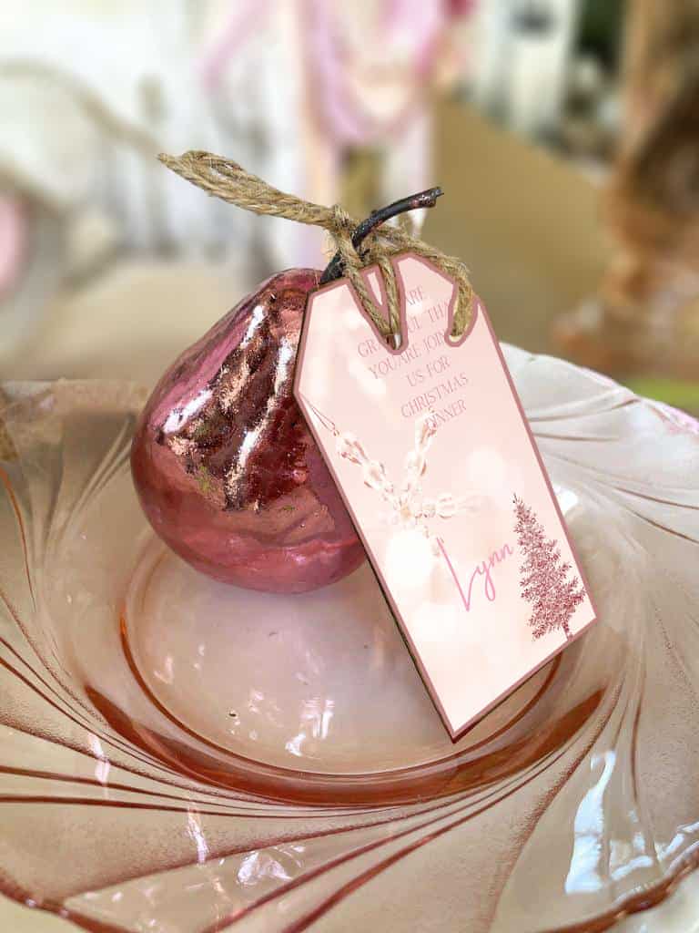 Pink gold foiled pear used to tie a name card onto for Christmas dinner.